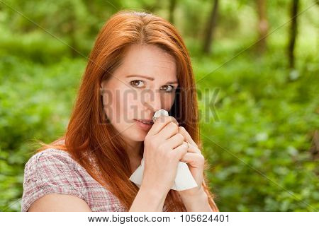 Woman is sneezing