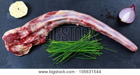Fresh Raw Beef Oxtail Meat ready to cook. on Blue stone  Background.