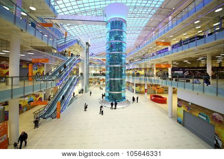 MOSCOW - DEC 05, 2014: Interior with high aquarium inside the mall Aviapark