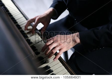 Close up of musician hands classic piano playing