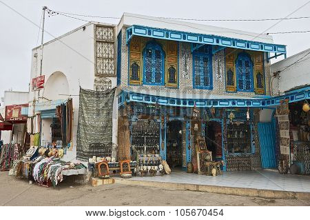 Exterior of a souvenir shop entrance in El Djem, Tunisia.