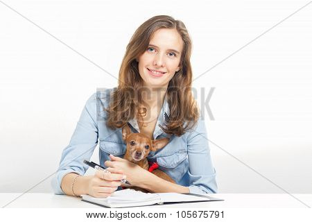 The Girl With A Small Doggie Writes Notes