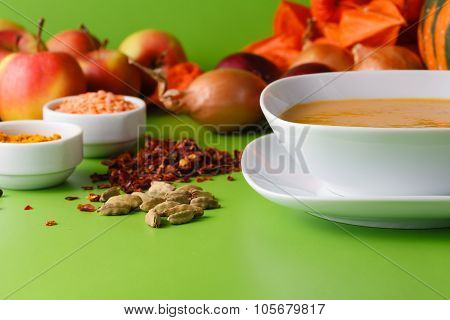 Pumpkin Soup With Onion And Pepper On Green Shadowless Backgroud