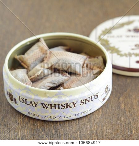 MOSCOW, RUSSIA - June 02, 2015: Swedish Islay Whisky snus (chewing tobacco) closeup. Shallow DOF!