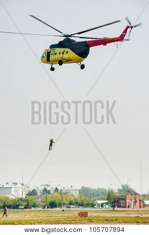Rescuers are landed from MI-8 helicopter