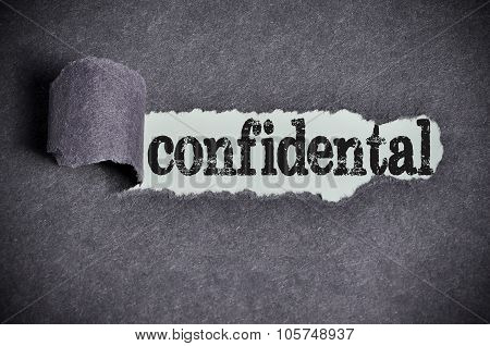 Confidental Word Under Torn Black Sugar Paper