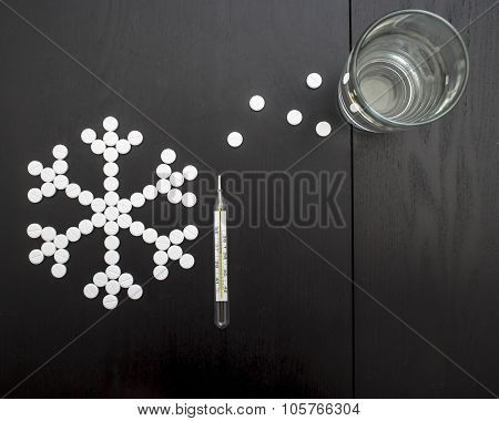 concept snowflakes made from medicinal tablets