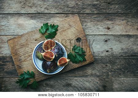 Ripe Figs On Board In Rustic Style