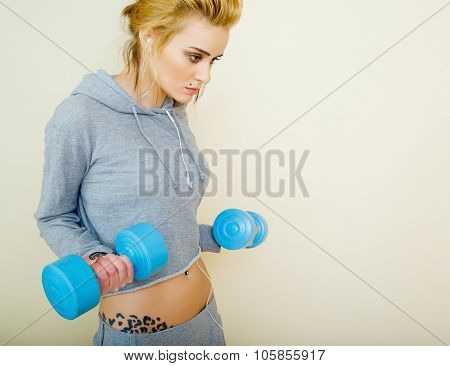 Determined young woman preparing for her workout.