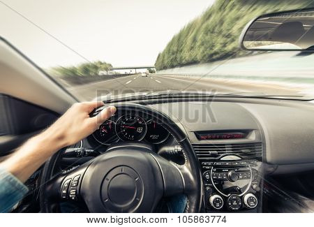 Driving Fast With A Sport Car