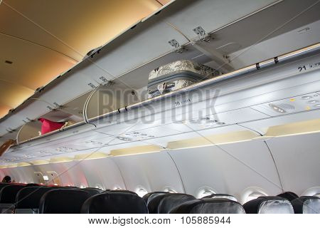 Cabin Baggage Overhead On The Airplane