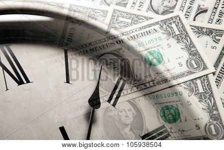 Clock On The Background Of Banknotes Dollars