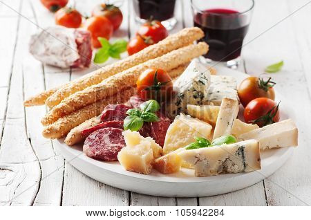 Concept Of Italian Antipasto With Cheese And Sausage