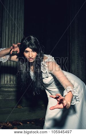 Witch from a crypt in the cemetery
