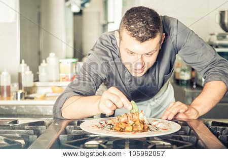 Young Chef Preparing A Tasty Meal