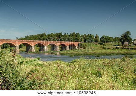 The Bridge Over The River In Latvia