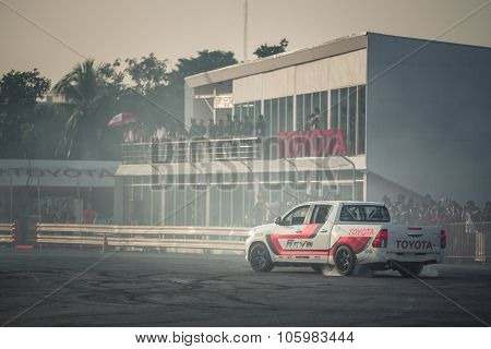 Pick-up Car Perform Burnout Tire On The Track