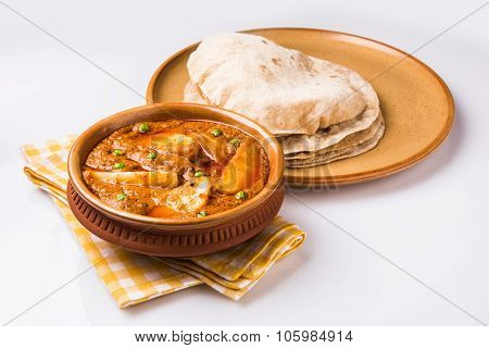 indian potato curry with chapati or roti