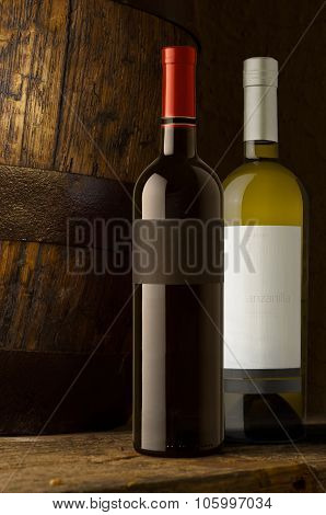 Still life with wine bottles glasses and oak barrels.