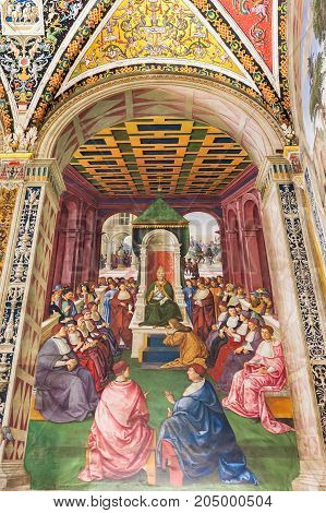 Siena Italy - April 04 2017: Painting in Piccolomini Library in Siena Cathedral (Duomo di Siena)