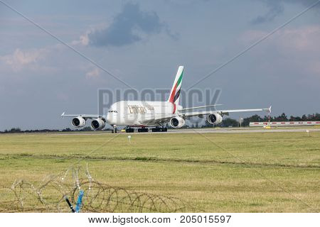 PRAGUE CZECH REPUBLIC - SEPTEMBER 20 2017: EMIRATES AIRLINES Airbus A380-800 rolls on the runway before departure from Prague. Emirates is an airline of the United Arab Emirates based in Dubai.