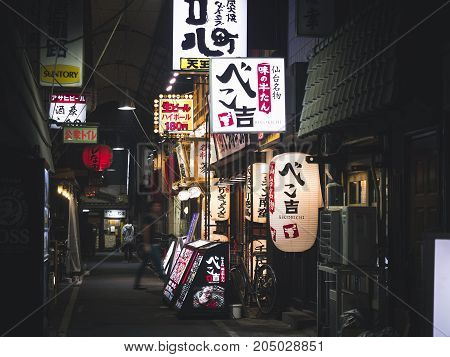 OSAKA JAPAN - APR 19 2017 : Restaurant Bar street shop sign Japan Izakaya Night life