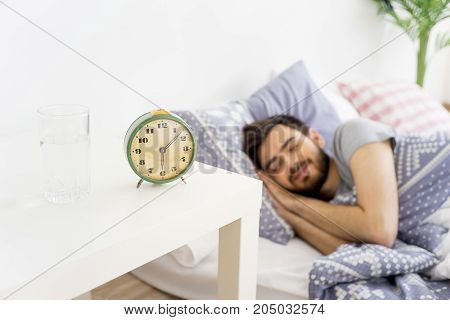 A man is overslept, he missed the alarm