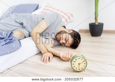A man is overslept, he missed the alarm