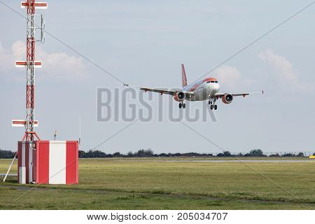 PRAGUE CZECH REPUBLIC - SEPTEMBER 20 2017: EasyJet Airline Airbus A319-111 lands to PRG Airport in Prague. EasyJet is the second-largest low-cost carrier in Europe.