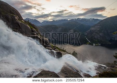 Summer Mountain Langfossen Waterfall On Slope Etne, Norway.