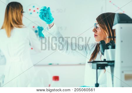 Scientific Research In The Lab, Toned Image, Two Women