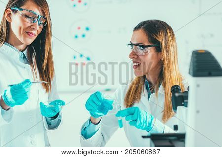 Female Scientist In The Lab, Toned Image, Two Women