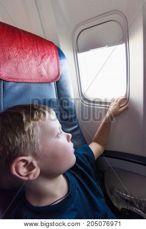 In The Cabin Of The Plane The Boy