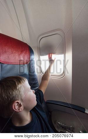 In The Cabin Of The Plane The Boy