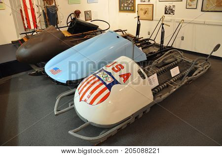 LAKE PLACID, NY, USA - MAR. 20, 2011: Antique Bobsled in Olympic Museum, Lake Placid, New York State, USA. Lake Placid hosted 1932 and 1980 Winter Olympic Games, Adirondack Mountains, New York, USA.