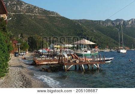 Marmaris, Turkey - August 16, 2017:  Scenery of small bay with jetty and boats in Marmaris, Turkey