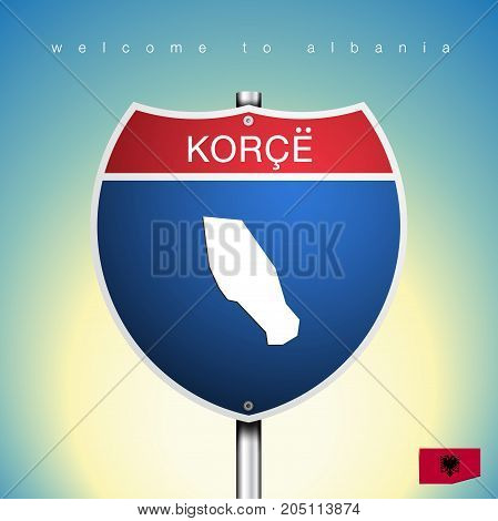 An Sign Road America Style with state of Albania with Green background and message Korce and map vector art image illustration