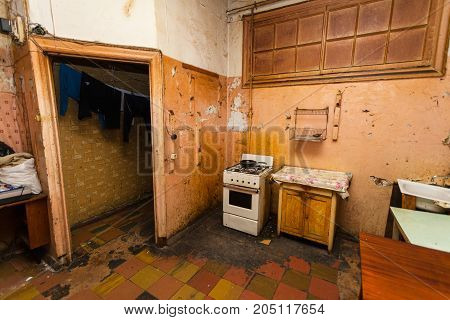 Dirty kitchen is in the temporary apartment for living (existence) refugees