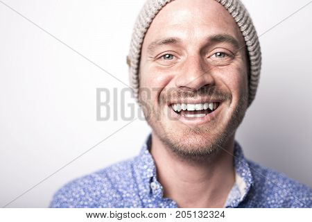 A Portrait of european man isolated over white background. Caucasian male model in studio shoot.