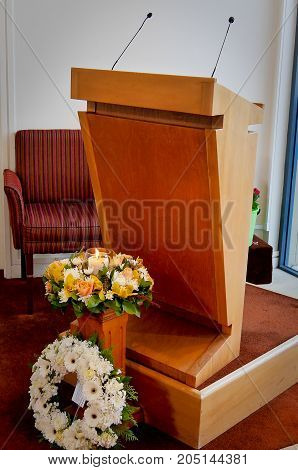 flowers & mic stand for funeral service