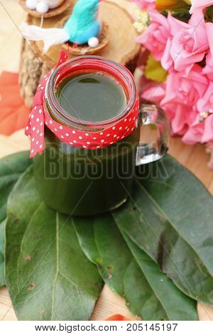 Bamboo grass juice or Tiliacora triandra (bai-ya-nang)