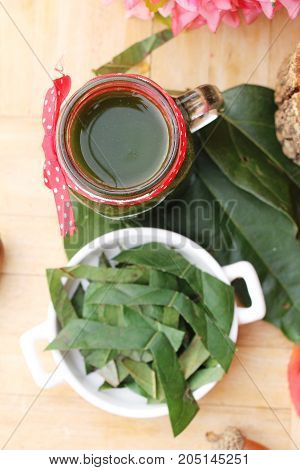 Bamboo grass juice or Tiliacora triandra (bai-ya-nang)