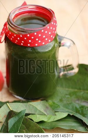 Bamboo grass juice or Tiliacora triandra (bai-ya-nang)