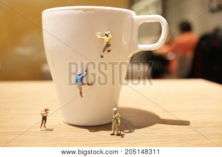 Fun Of Mini Tiny  People Climbing The Mug