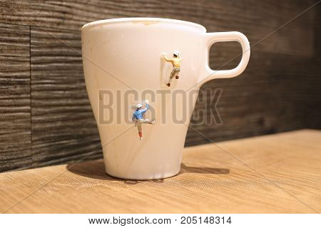 Fun Of Mini Tiny  People Climbing The Mug
