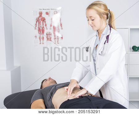 A Doctor examining her patient in medical office