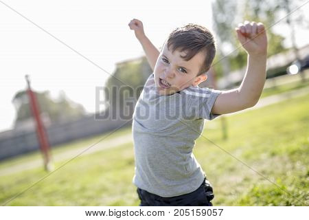 A Young caucassian soccer player football outside