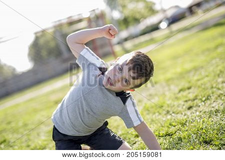 A Young caucassian soccer player football outside