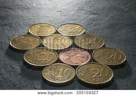 A mosaic of some euro cent coins