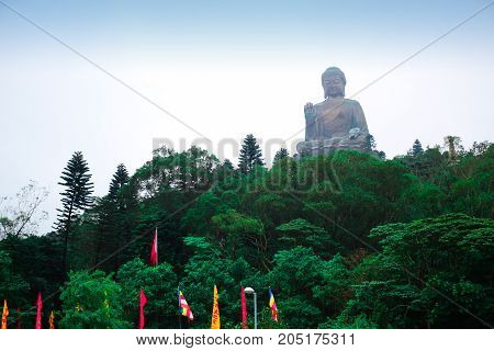 The enormous Tian Tan Buddha statue at high mountain near Po Lin Monastery, Lantau Island, Hong Kong